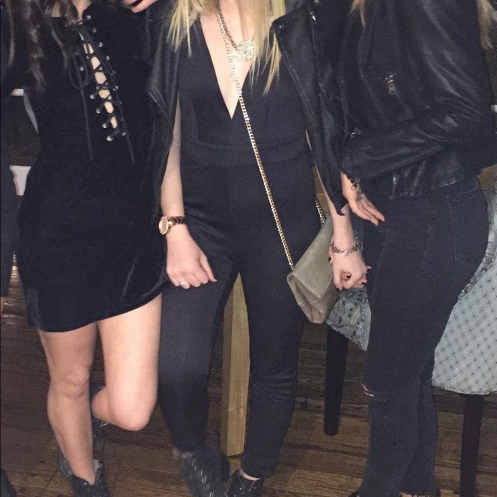 Stretchy black deep v jumpsuit with cross back